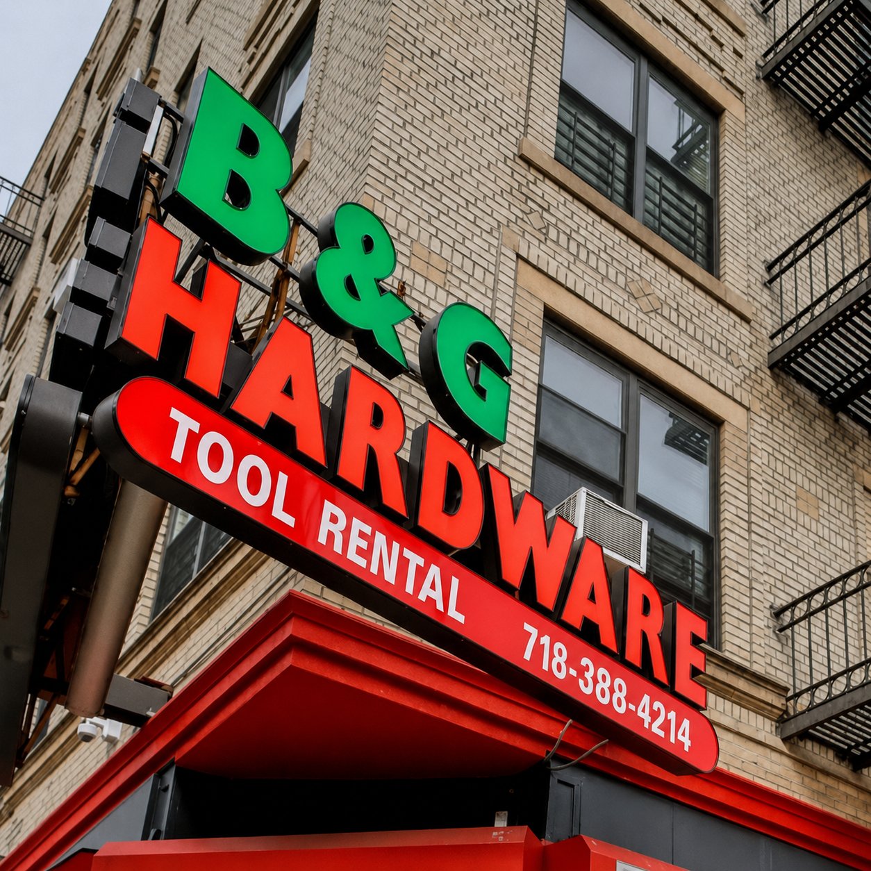 The B & G Hardware and Tool Rental sign above the store in Williamsburg